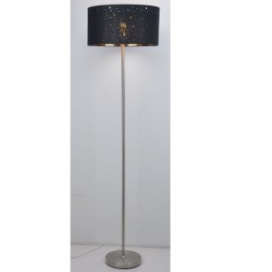 Floor lamp with laser cut black fabric shade