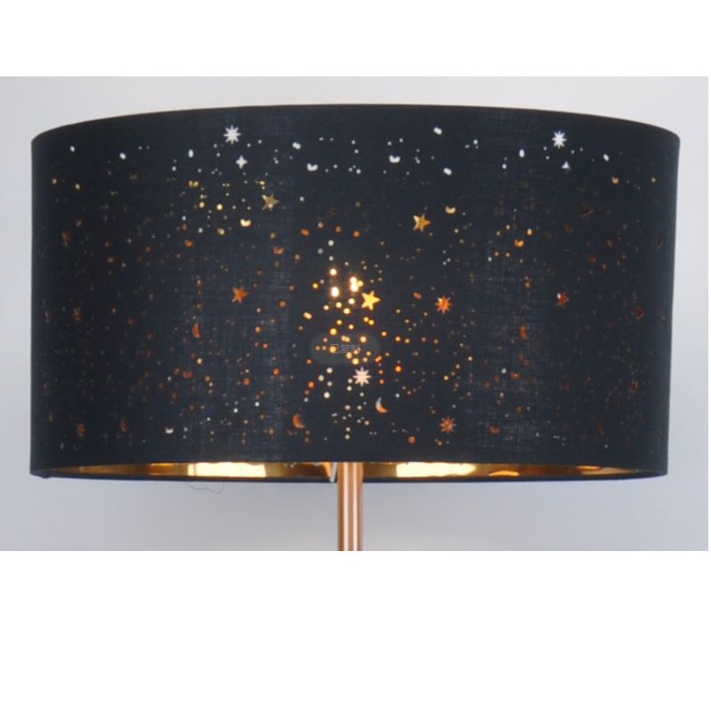 Floor lamp with laser cut black fabric shade