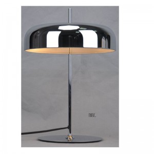 Table lamp with metal shade and flat base