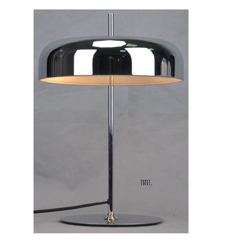 Table lamp with metal shade and flat base