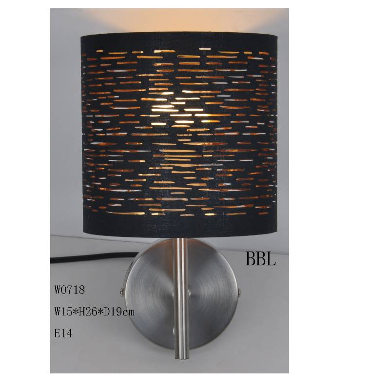 wall lamp with laser cut fabric shade